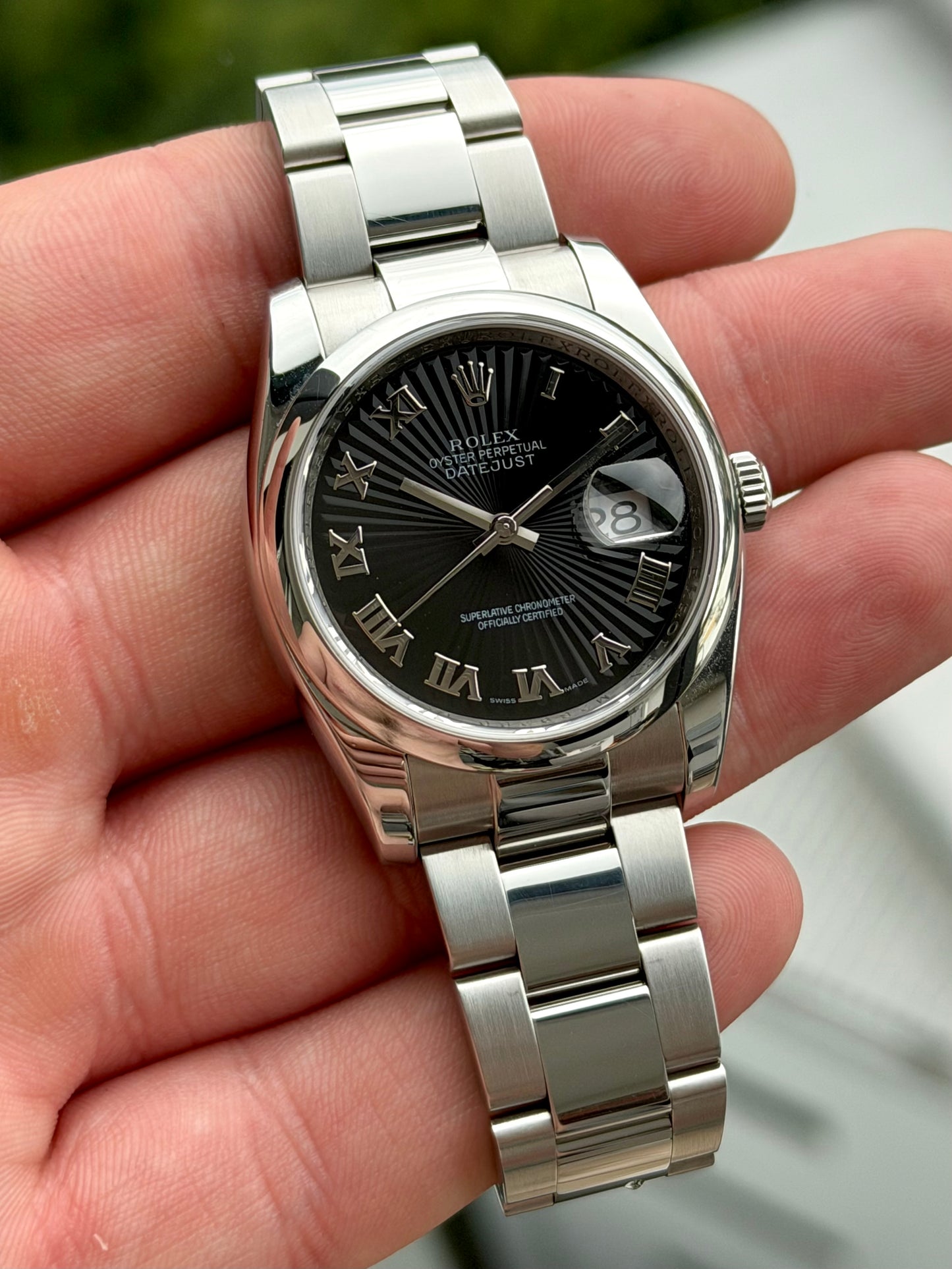 Rolex Datejust Black Sunbeam Dial 116200